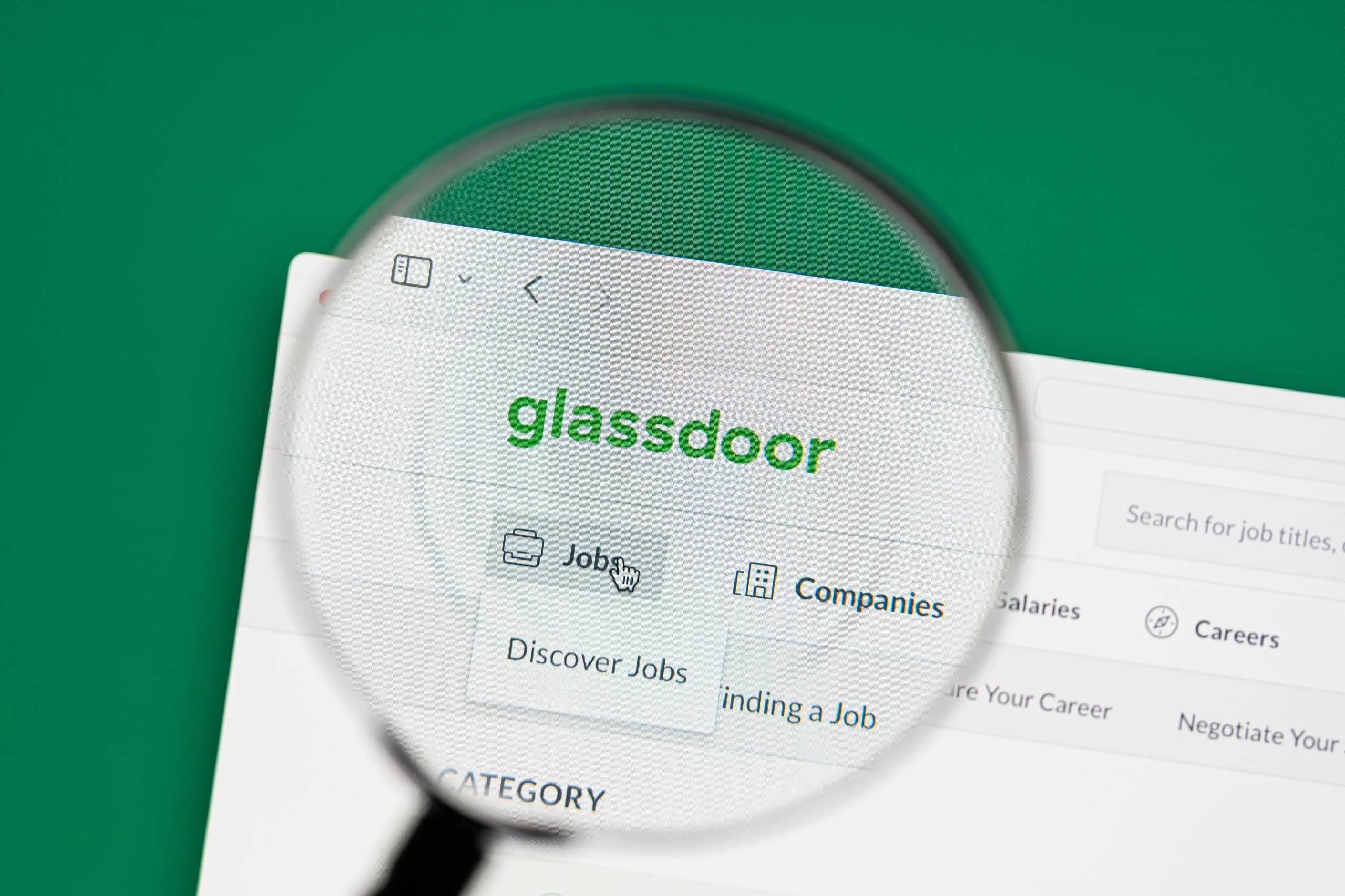 Glassdoor on a computer screen with a magnifying glass.
