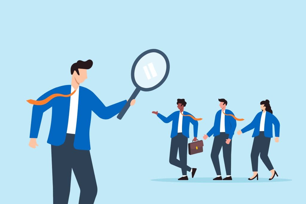 Illustration of a person holding a large magnifying glass, looking at three businesspeople walking together, all in blue jackets, with one carrying a briefcase.