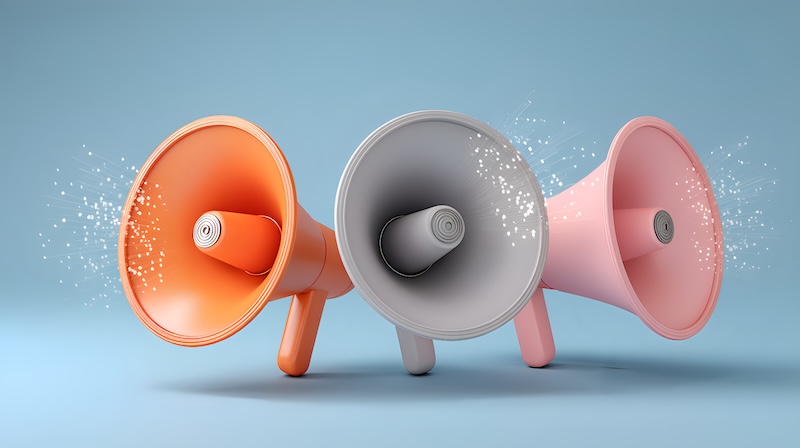Group of three colorful megaphones, orange, white, and pink, broadcasting white particle streams illustrating concepts of communication, marketing, and public announcement on a light blue background.